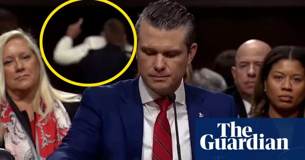 Protesters interrupt Trump’s pick for defence secretary during hearing – video | Pete Hegseth