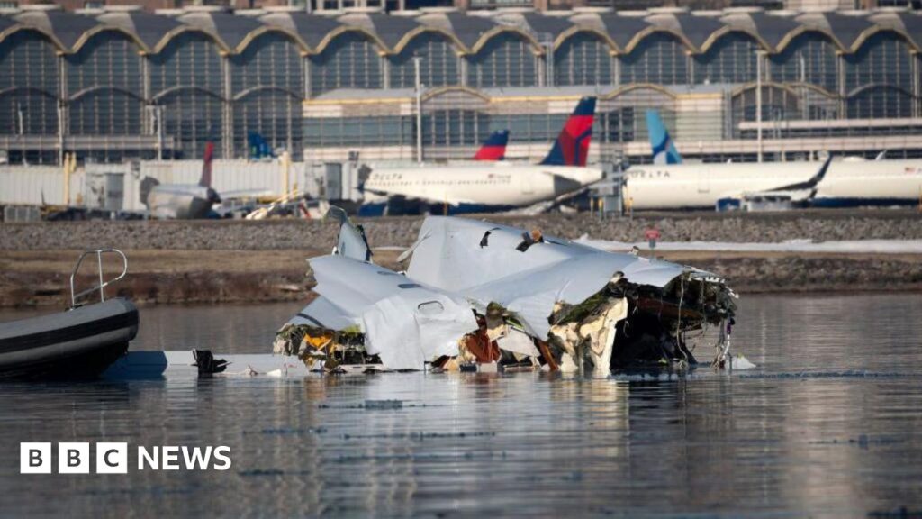 Washington DC plane crash: Black boxes found as airport staffing probed