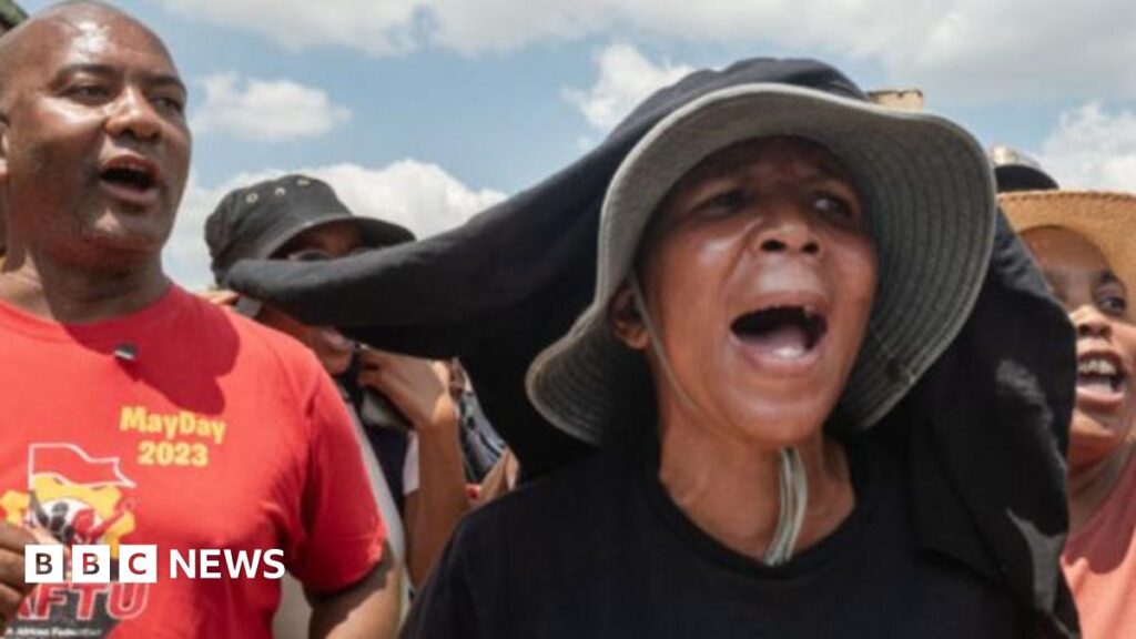 South Africa’s Stilfontein mine: Relatives wait for news as body bags hauled from shaft