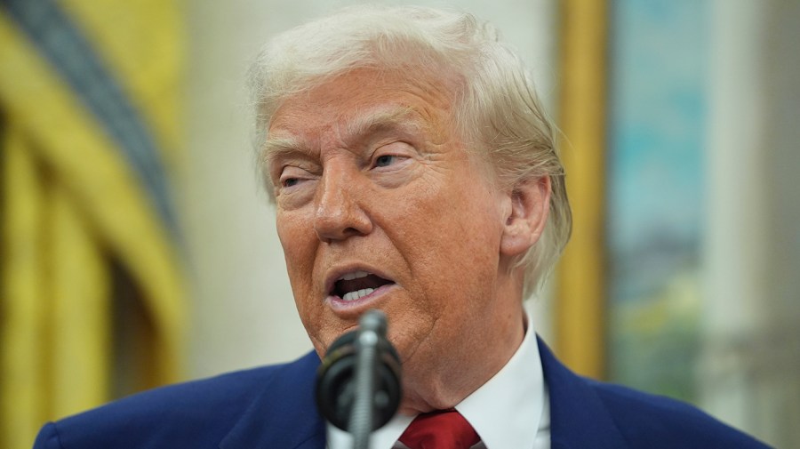 Trump denies Iran deal will allow uranium enrichment